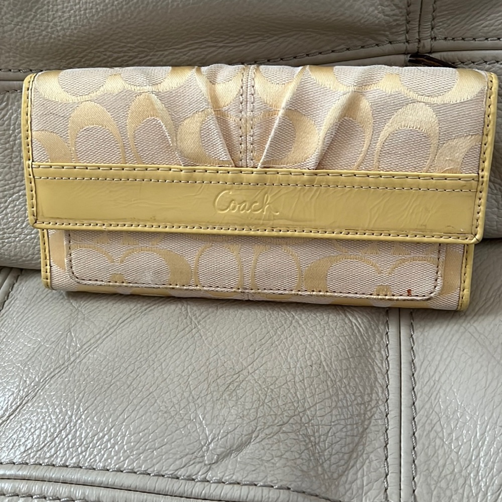 Trifold with leather trim/See photos for more details on condition.